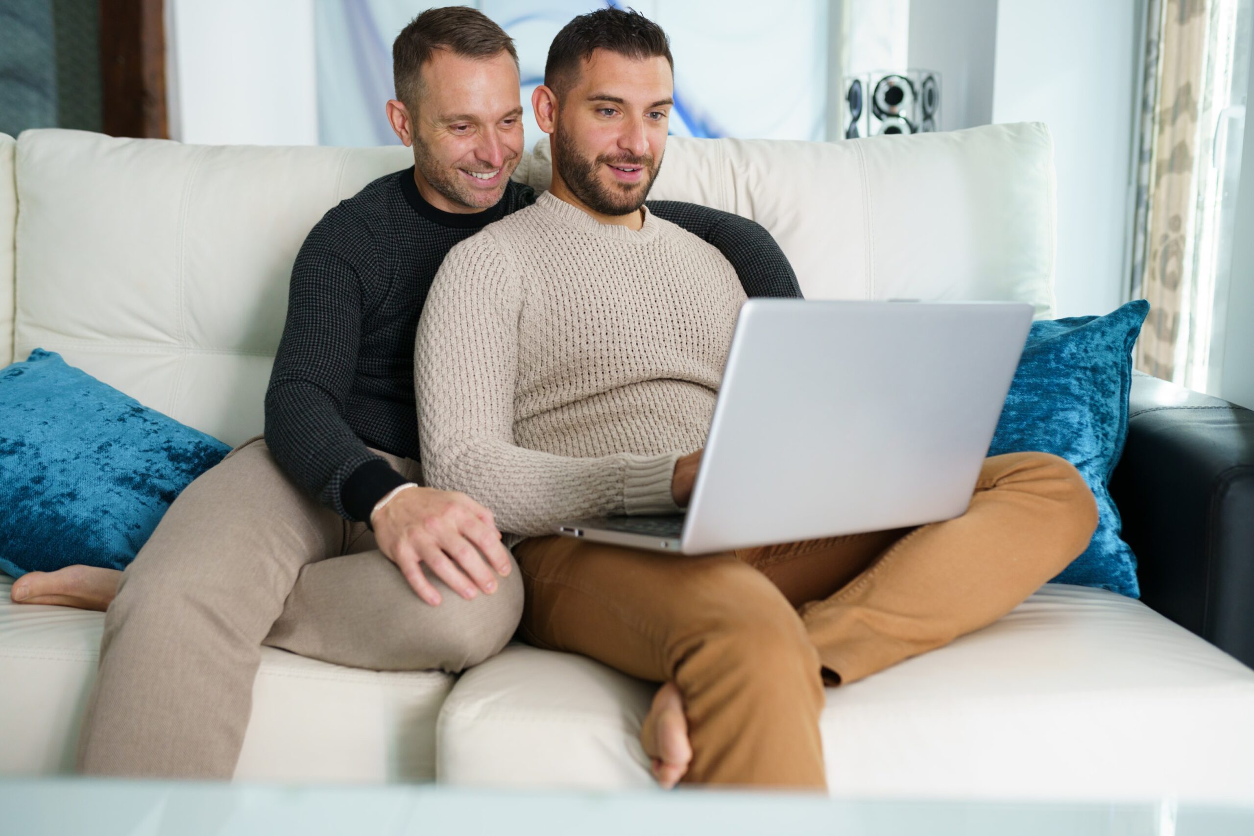 Gay couples therapy online session for NYC partners working through infidelity with a compassionate therapist in a virtual safe space.