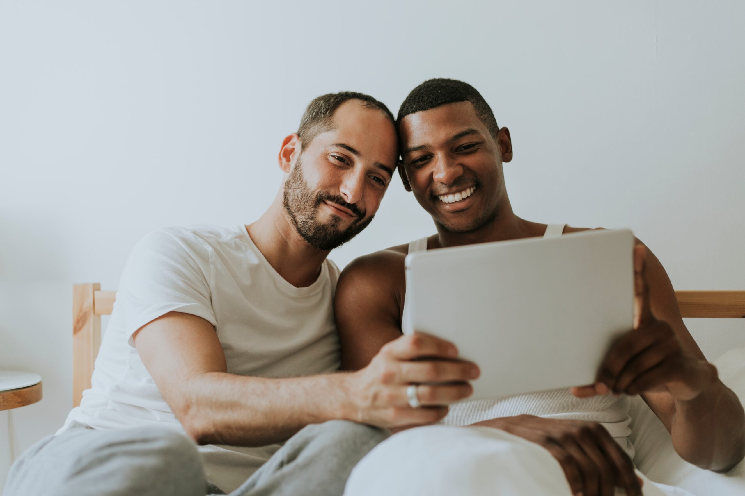 Digital whiteboard showing Gottman Method approach to understanding different types of affairs during virtual therapy for gay couples.